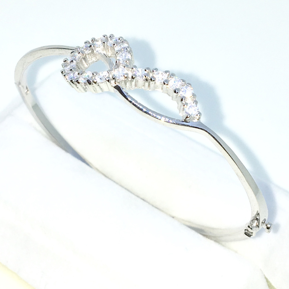 Silver Oval Bangle Bracelet 4 prong White round CZ